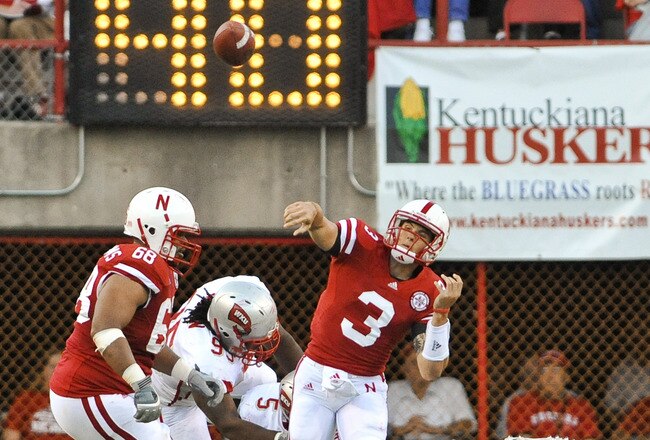 LINCOLN, NE - SEPTEMBER 04: Taylor Martinez #3 of the Nebraska Cornhuskers  passes the ball down field against the Western Kentucky Hilltoppers  during first half action of their game at Memorial Stadium on September 4, 2010 in Lincoln, Nebraska. Nebraska