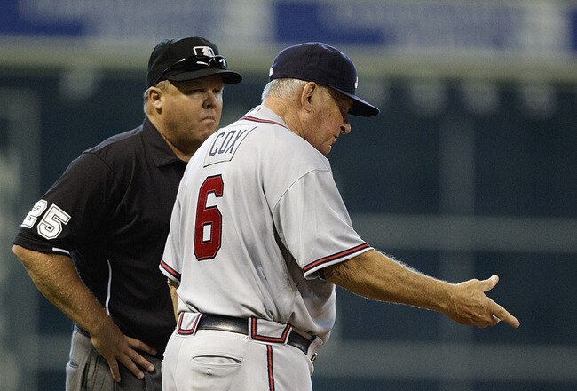 HOUSTON - AUGUST 11:  Manager Bobby Cox #6 of the Atlanta Braves argues with third base umpire Fieldin Culbreth as to whether Michael Bourn of the Houston Astros was safe as he stole third base at Minute Maid Park on August 11, 2010 in Houston, Texas.  (P