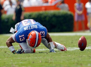 GAINESVILLE, FL - SEPTEMBER 04:  Trey Burton #13 of the Florida Gators attempts a reception against  the Miami University RedHawks at Ben Hill Griffin Stadium on September 4, 2010 in Gainesville, Florida.  (Photo by Sam Greenwood/Getty Images)
