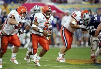 31 Dec 1997: Quarterback Donovan McNabb #5 of Syracuse carries out an option during the Orangemen 35-18 loss to Kansas State during the Fiesta Bowl at Sun Devil Stadium in Tempe, Arizona.