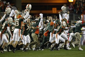 TEMPE, AZ - JANUARY 3:  Before seeing the flag thrown by an official, the Miami Hurricanes players and the coaches celebrate at the end of the first over-time against the Ohio State Buckeyes in the Tostitos Fiesta Bowl on January 3, 2003 at Sun Devil Stad