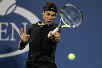 NEW YORK - SEPTEMBER 07:  Rafael Nadal of Spain hits a return against Feliciano Lopez of Spain during his men's singles match on day nine of the 2010 U.S. Open at the USTA Billie Jean King National Tennis Center on September 7, 2010 in the Flushing neighb