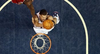 EAST RUTHERFORD, NJ - MARCH 03:  Brook Lopez #11 of the New Jersey Nets goes to the hoop against J.J. Hickson #21 of the Cleveland Cavaliers at the Izod Center on March 3, 2010 in East Rutherford, New Jersey.NOTE TO USER: User expressly acknowledges and a