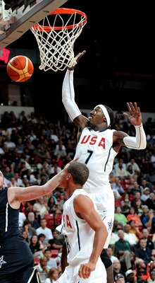 LAS VEGAS - JULY 24:  Kevin Love #13 of the 2010 USA Basketball Men's National Team reacts after being fouled by Stephen Curry #8 of the 2010 USA Basketball Men's National Team as teammate Gerald Wallace #7 trails the play during a USA Basketball showcase