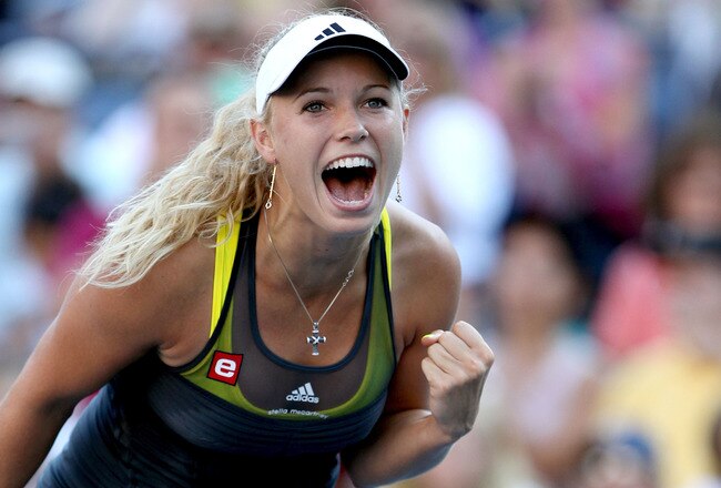 NEW YORK - SEPTEMBER 06:  Caroline Wozniacki of Denmark celebrates match point against Maria Sharapova of Russia during the women's singles match on day eight of the 2010 U.S. Open at the USTA Billie Jean King National Tennis Center on September 6, 2010 i