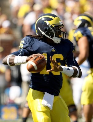 ANN ARBOR, MI - SEPTEMBER 19:  Quarterback Denard Robinson #16 of the Michigan Wolverines throws a pass against the Eastern Michigan Eagles at Michigan Stadium on September 19, 2009 in Ann Arbor, Michigan.  Michigan won 45-17.  (Photo by Stephen Dunn/Gett