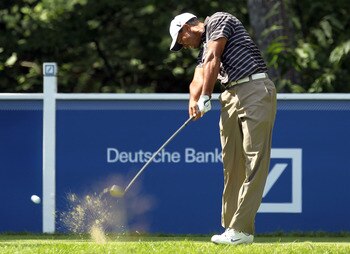 NORTON, MA - SEPTEMBER 05:  Tiger Woods tees off on the fourth hole during the third round of the Deutsche Bank Championship at TPC Boston on September 5, 2010 in Norton, Massachusetts.  (Photo by Mike Ehrmann/Getty Images)