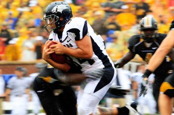 COLUMBIA, MO - SEPTEMBER 13:  Vai Taua #34 the Nevada Wolf Pack carries the ball during the first half of the game against the Missouri Tigers on September 13, 2008 at Memorial Stadium in Columbia, Missouri.  (Photo by Jamie Squire/Getty Images)
