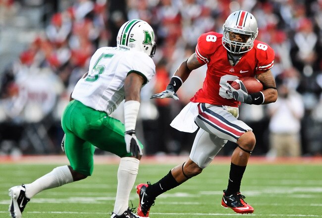 COLUMBUS, OH - SEPTEMBER 2: DeVier Posey #8 of the Ohio State Buckeyes runs with the ball against the the Marshall Thundering Herd at Ohio Stadium on September 2, 2010 in Columbus, Ohio. (Photo by Jamie Sabau/Getty Images)