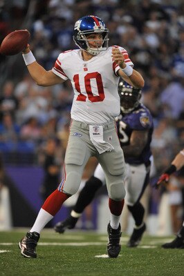 BALTIMORE - AUGUST 28:  Eli Manning #10 of the New York Giants passes against the Baltimore Ravens at M&T Bank Stadium on August 28, 2010 in Baltimore, Maryland. The Ravens lead the Giants at halftime 17-3. (Photo by Larry French/Getty Images)