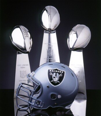 Lombardi trophies from Super Bowls XI, XV, and XVIII