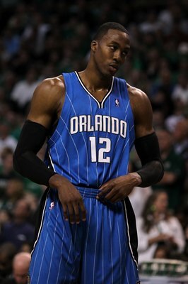 BOSTON - MAY 28:  Dwight Howard of the Orlando Magic looks on against the Boston Celtics in Game Six of the Eastern Conference Finals during the 2010 NBA Playoffs at TD Garden on May 28, 2010 in Boston, Massachusetts.  NOTE TO USER: User expressly acknowl