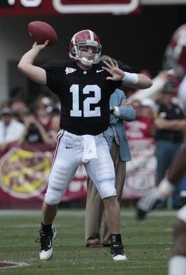 TUSCALOOSA, AL - APRIL 17: Quarterback Greg McElroy (12) of the University of Alabama looks for a receiver during the Alabama spring game at Bryant Denny Stadium on April 17, 2010 in Tuscaloosa, Alabama. (Photo by Dave Martin/Getty Images)