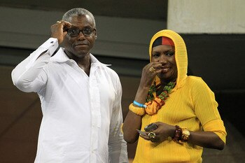 NEW YORK - SEPTEMBER 07:  (L-R) Track and Field Olympic Gold Medalist Carl Lewis and actor Grace Jones attend the men's singles match between Rafael Nadal and Feliciano Lopez of Spain during day nine of the 2010 U.S. Open at the USTA Billie Jean King Nati