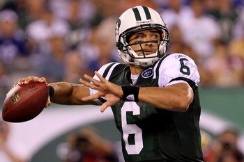 EAST RUTHERFORD, NJ - AUGUST 16:  Quarterback Mark Sanchez #6 of the New York Jets passes against the New York Giants during their game at New Meadowlands Stadium on August 16, 2010 in East Rutherford, New Jersey.  (Photo by Nick Laham/Getty Images)