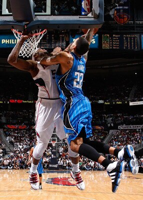ATLANTA - MAY 10:  Josh Smith #5 of the Atlanta Hawks blocks a dunk by Matt Barnes #22 of the Orlando Magic during Game Four of the Eastern Conference Semifinals of the 2010 NBA Playoffs at Philips Arena on May 10, 2010 in Atlanta, Georgia.  NOTE TO USER: