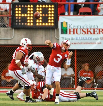 LINCOLN, NE - SEPTEMBER 04: Taylor Martinez #3 of the Nebraska Cornhuskers  passes the ball down field against the Western Kentucky Hilltoppers  during first half action of their game at Memorial Stadium on September 4, 2010 in Lincoln, Nebraska. Nebraska