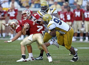 ATLANTA - NOVEMBER 1:  Defensive end Vance Walker #99 of the Georgia Tech Yellow Jackets tackles quarterback Christian Ponder #7 of the Florida State Seminoles during the game at Bobby Dodd Stadium at Historic Grant Field on November 1, 2008 in Atlanta, G