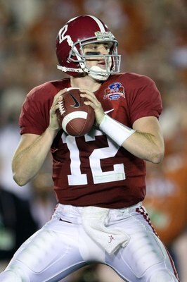 PASADENA, CA - JANUARY 07:  Quarterback Greg McElroy #12 of the Alabama Crimson Tide throws the ball against the Texas Longhorns in the second half of the Citi BCS National Championship game at the Rose Bowl on January 7, 2010 in Pasadena, California.  (P
