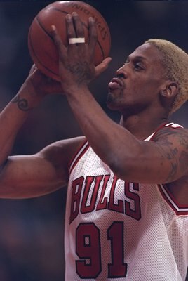 25 Apr 1997:  Dennis Rodman of the Chicago Bulls shoots a free throw during their 98-86 win over the Washington Bullets in the NBA first round playoffs at United Center in Chicago, Illinois.  Mandatory Credit: Jonathan Daniel  /Allsport