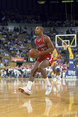LOS ANGELES - JANUARY 1:  Ken Norman #33 of the Los Angeles Clippers shoots the ball, during the NBA game against the Los Angeles Lakers at the Great Western Forum, in Los Angeles, California on January 1, 1989.  NOTE TO USER: User expressly acknowledges