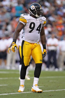 DENVER - AUGUST 29:  Linebacker Lawrence Timmons #94 of the Pittsburgh Steelers defends against the Denver Broncos during preseason NFL action at INVESCO Field at Mile High on August 29, 2010 in Denver, Colorado. The Broncos defeated the Steelers 34-17.  