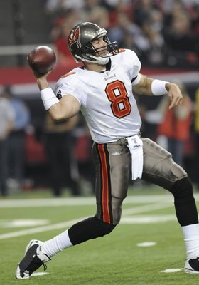 ATLANTA - DECEMBER 14: Quarterback Brian Griese #8 of the Tampa Bay Buccaneers sets to pass against the Atlanta Falcons at the Georgia Dome on December 14, 2008 in Atlanta, Georgia.  (Photo by Al Messerschmidt/Getty Images)