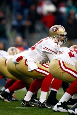 SEATTLE , WA - DECEMBER 06:  Quarterback Alex Smith #11 of the San Francisco 49ers throws the ball against the Seattle Seahawks  at Qwest Field on December 6, 2009 in Seattle, Washington.  (Photo by Jonathan Ferrey/Getty Images)