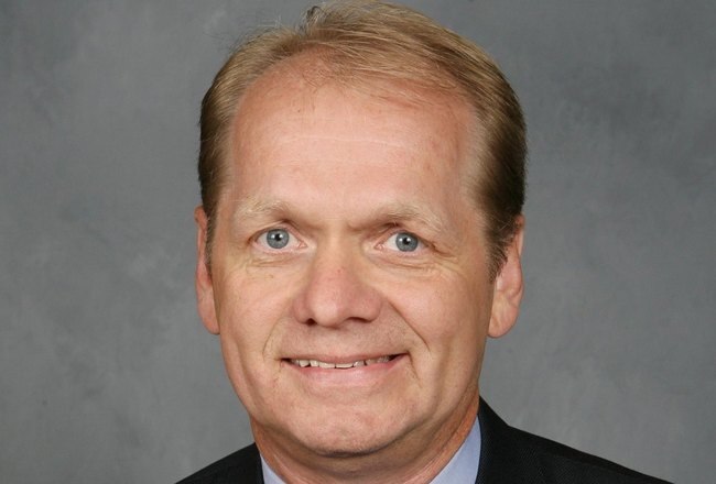 BUFFALO, NY - 2007:  Darcy Regier of the Buffalo Sabres poses for his 2007 NHL headshot at photo day in Buffalo, New York. (Photo by Getty Images)