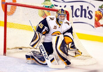 BOSTON, MA - APRIL 5: Goalie Jocelyn Thibault #35 of the Buffalo Sabres makes a save during the third period at the TD Banknorth Garden on April 5, 2008 in Boston, Massachusetts.  The Sabres won 3-0. (Photo by Jim Rogash/Getty Images)