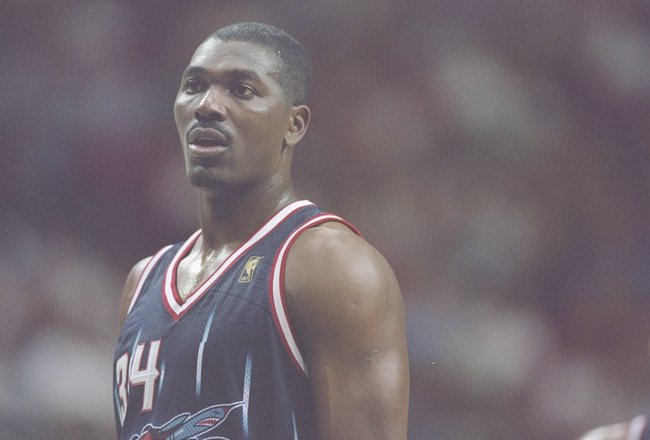 18 Oct 1996:  Center Hakeem Olajuwon of the Houston Rockets looks on during a game against the Orlando Magic at the Orlando Arena in Orlando, Florida.  The Magic won the game 95-83. Mandatory Credit: Andy Lyons  /Allsport