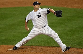 NEW YORK - AUGUST 22:  Joba Chamberlain #62 of the New York Yankees delivers a pitch against the Seattle Mariners on August 22, 2010 at Yankee Stadium in the Bronx borough of New York City.The Yankees defeated the Mariners 10-0.  (Photo by Jim McIsaac/Get