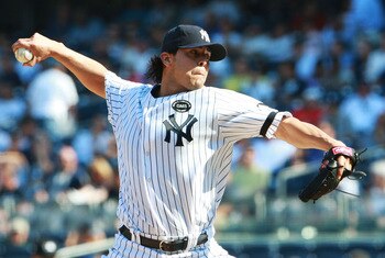 NEW YORK - AUGUST 19:  Sergio Mitre #45 the New York Yankees pitches against the Detroit Tigers at Yankee Stadium on August 19, 2010 in the Bronx borough of New York City.  (Photo by Andrew Burton/Getty Images)