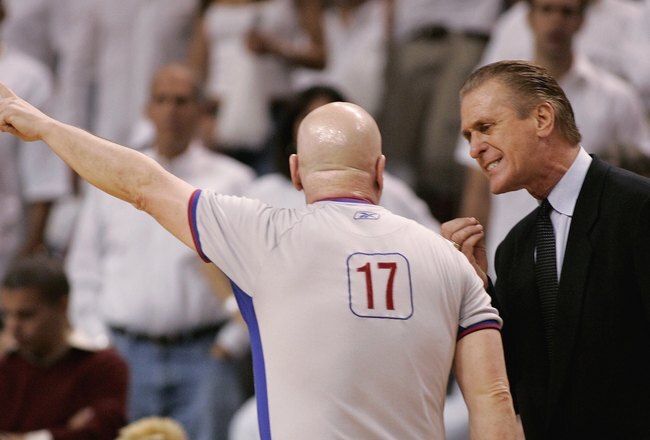 MIAMI - APRIL 22:  Head coach Pat Riley of the Miami Heat argues with referee Joe Crawford #17 after a technical foul was called on Miami's Udonis Haslem #40 and he was ejected from the game against the Chicago Bulls in game one of the Eastern Conference