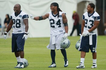 OXNARD, CA - AUGUST 14:  (L-R) Running backs Felix Jones #28, Marion Barber #24 and Tashard Choice #23 share a laugh during Dallas Cowboys Training Camp at the Marriott Residence Inn Oxnard River Ridge on August 14, 2010 in Oxnard, California.  (Photo by 