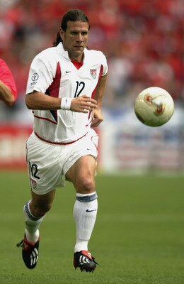 DAEGU - JUNE 10:  Jeff Agoos of USA and Jung Hwan Ahn of South Korea running after the ball during the Group D match of the World Cup Group Stage played at the Daegu World Cup Stadium, Daegu, South Korea on June 10, 2002. Thje match ended in a 1-1 draw. (