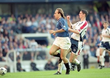 30 Apr 2000:  Sebastian Rozental of Glasgow Rangers holds off Lee Wilkie of Dundee during the Scottish Premier Division match at Ibrox in Glasgow, Scotland.  Glasgow Rangers won the match 3-0. \ Mandatory Credit: Shaun Botterill /Allsport