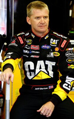 LOUDON, NH - SEPTEMBER 18:  Jeff Burton, driver of the #31 Caterpillar Chevrolet, looks on in the garage during practice for the NASCAR Sprint Cup Series Sylvania 300 at New Hampshire Motor Speedway on September 18, 2010 in Loudon, New Hampshire.  (Photo