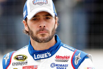 LOUDON, NH - SEPTEMBER 17:  Jimmie Johnson, driver of the #48  Lowe's / Johns Manville, looks on during qualifying for the NASCAR Sprint Cup Series Sylvania 300 at New Hampshire Motor Speedway on September 17, 2010 in Loudon, New Hampshire.  (Photo by Tod