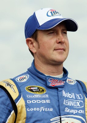 LOUDON, NH - SEPTEMBER 18:  Kurt Busch, driver of the #2 Miller Lite Dodge, walks through the garage during practice for the NASCAR Sprint Cup Series Sylvania 300 at New Hampshire Motor Speedway on September 18, 2010 in Loudon, New Hampshire.  (Photo by E