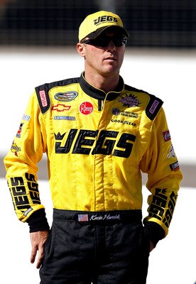 LOUDON, NH - SEPTEMBER 18:  Kevin Harvick, driver of the JEGS.com Chevrolet walks along the grid  during qualifying for the NASCAR Camping World Truck Series TheRaceDayRaffleSeries.com 175 at the New Hampshire Motor Speedway on September 18, 2010 in Loudo
