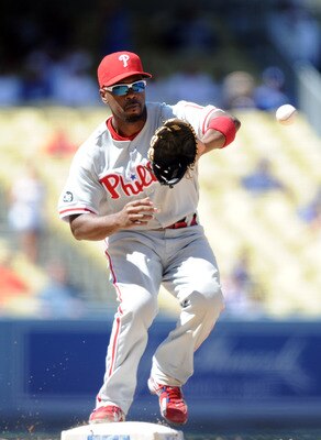 LOS ANGELES, CA - SEPTEMBER 01:  Jimmy Rollins #11 of the Philadelphia Phillies catches a throw to second base against the Los Angeles Dodgers at Dodger Stadium on September 1, 2010 in Los Angeles, California.  (Photo by Harry How/Getty Images)