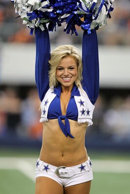 ARLINGTON, TX - SEPTEMBER 19:  A Dallas Cowboys Cheerleader performs during a game against the Chicago Bears at Cowboys Stadium on September 19, 2010 in Arlington, Texas.  (Photo by Ronald Martinez/Getty Images)