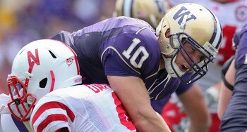SEATTLE - SEPTEMBER 18: Quarterback Jake Locker #10 of the Washington Huskies is tackled by linebacker Lavonte David #4 of the Nebraska Cornhuskers on September 18, 2010 at Husky Stadium in Seattle, Washington. (Photo by Otto Greule Jr/Getty Images)