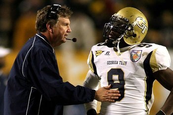 Coach Johnson and QB Joshua Nesbitt