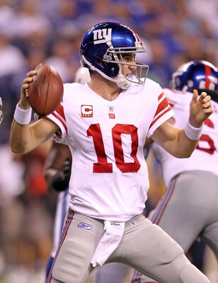 INDIANAPOLIS - SEPTEMBER 19:  Eli Manning #10  of the New York Giants throws a pass during the NFL game against the Indianapolis Colts at Lucas Oil Stadium on September 19, 2010 in Indianapolis, Indiana.  (Photo by Andy Lyons/Getty Images)