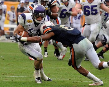 TAMPA, FL - JANUARY 1: Wide receiver Jeremy Ebert #11 of the Northwestern Wildcats grabs a pass against the Auburn Tigers in the Outback Bowl January 1, 2010 at Raymond James Stadium in Tampa, Florida.  (Photo by Al Messerschmidt/Getty Images)