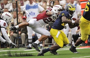 Denard Drags Tackler Into Endzone (detnews.com)