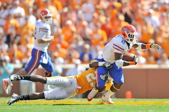 KNOXVILLE, TN - SEPTEMBER 18:  Jeff Demps #2 of the Florida Gators breaks away from Art Evans #25 of the Tennessee Volunteers at Neyland Stadium on September 18, 2010 in Knoxville, Tennessee.  (Photo by Grant Halverson/Getty Images)
