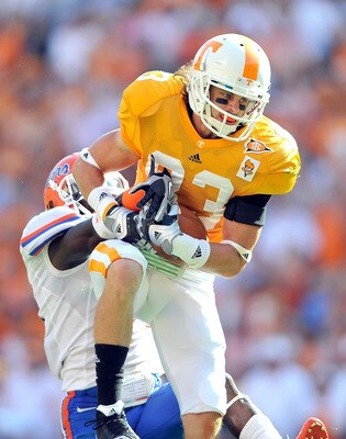 KNOXVILLE, TN - SEPTEMBER 18:  Zach Rogers #83 of the Tennessee Volunteers makes a catch as Ahmad Black #35 of the Florida Gators defends during the first half at Neyland Stadium on September 18, 2010 in Knoxville, Tennessee.  (Photo by Grant Halverson/Ge